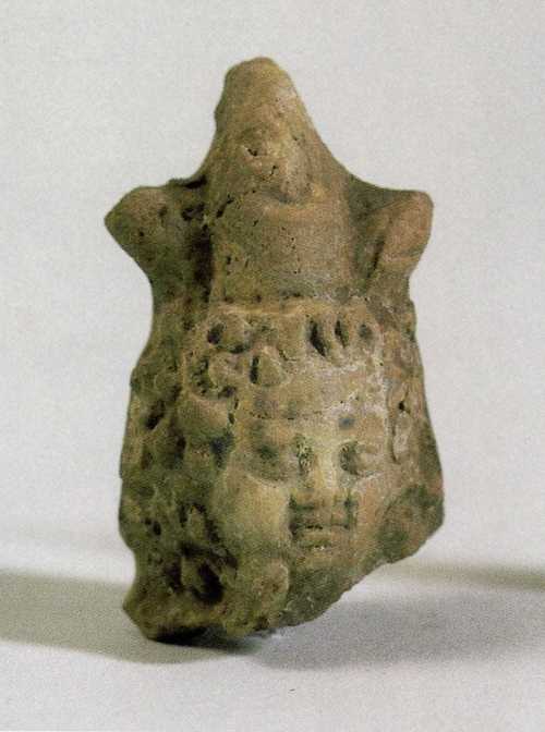 18a. Taposiris Magna. Acropolis. Terracotta figurine of Harpocrates (left); fragment of faiance sistrum (right) (Vörös 2004, p. 135)